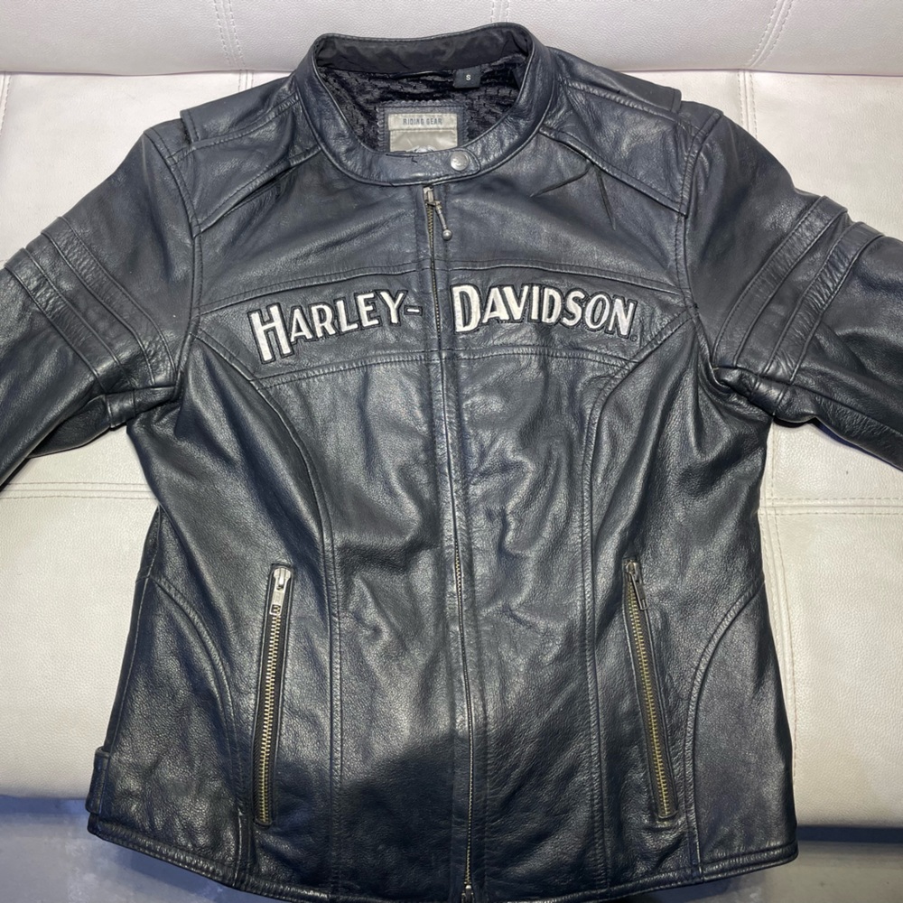 Woman’s small leather motorcycle jacket.